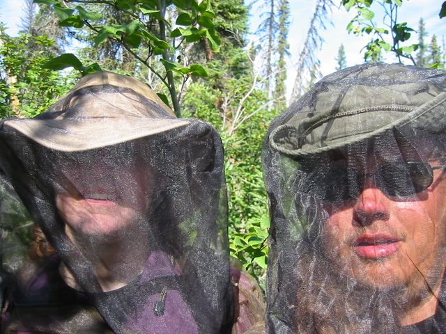 The two of us at the confluence in bug netting