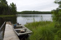 #7: A small jetty on the shore of the lake.  The confluence point is 155m away, in the lake.  To the left is the peninsula whose tip is 94m from the confluence point.