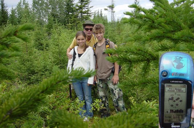 Myriam, Jean-Michel and my self at the confluence with the GPS