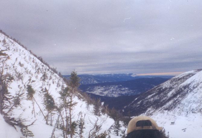 Looking SW from the confluence, the Mines Madeleine hut is just to the right of my head