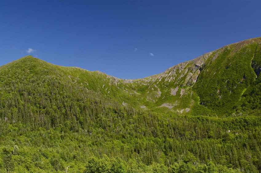 1 km from the point (which is just to the right of the left-hand peak).  Compare this photo to the first photo from Do Doille's winter-time visit