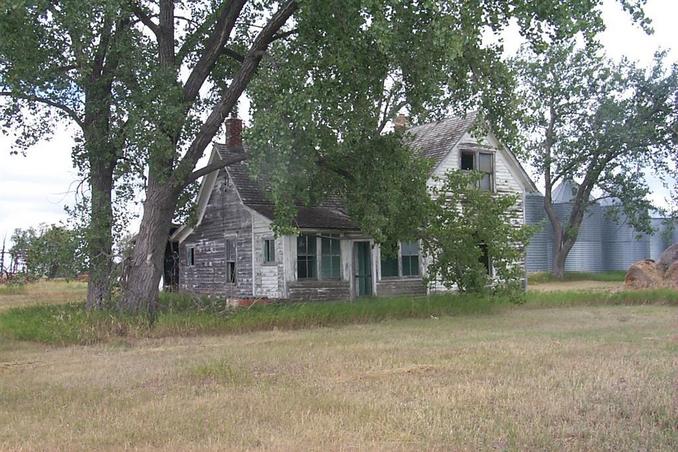 The old farm house on the corner of 59th Avenue NW and County Road 2