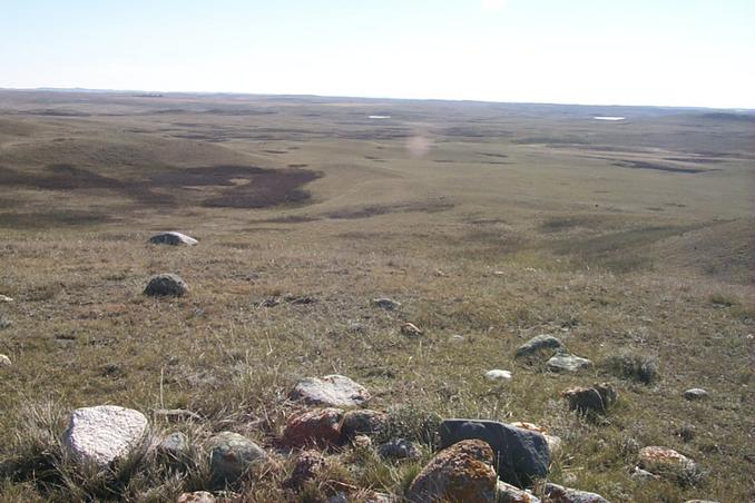 Overview from a hill 735 meters from the confluence which is conveniently marked by a sunspot on the screen.