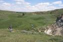 #3: View NE with Alan and Max at the confluence.  Ranch can be seen in the distance.