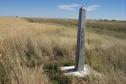 #9: The view southeast of the cement border monument about 800 m west of the confluence.