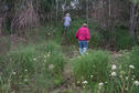 #6: Crossing a dry but muddy creek bed.