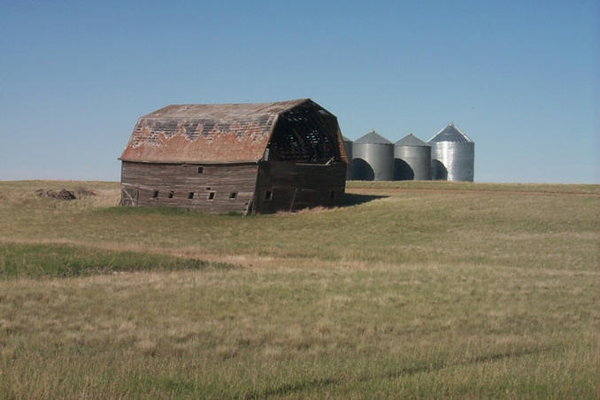 An old barn and grain bins in the area.