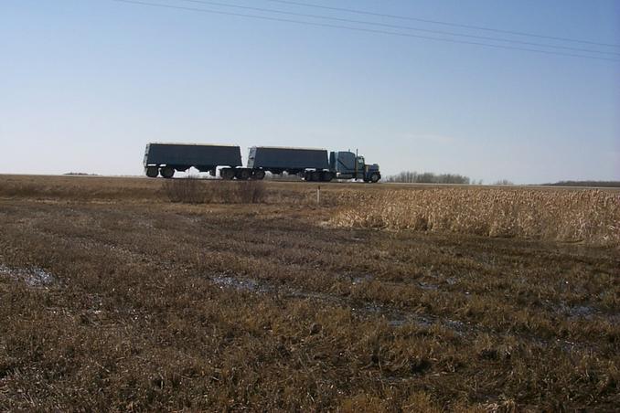 Looking south while standing on N52°.  The transport truck is passing by on Highway 5.