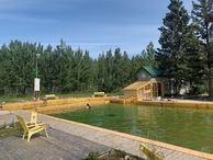 #6: Takhini Hot Spring, across Lake Laberge, west of the point