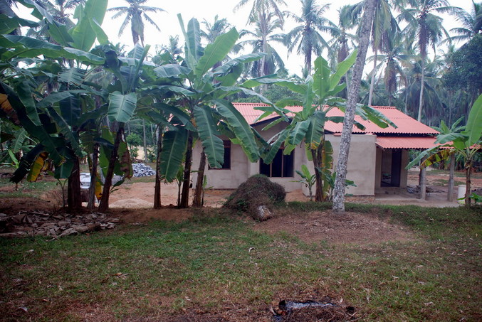 North view - new house under construction on the yard of the Confluence owner