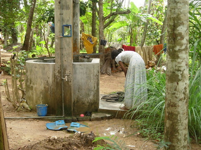 Girl by the well situated a few meters from the Confluence