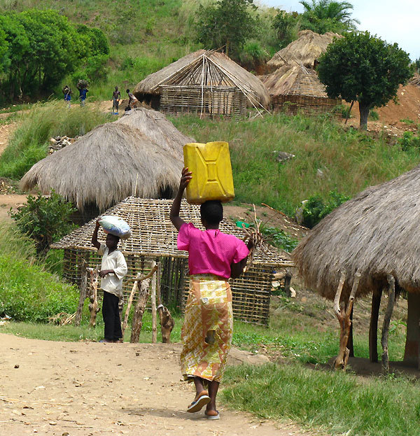 Woman carrying a canister