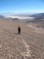 #10: Sharky walking on Guanaco trail back to camp.  View of Salar Pedernales.