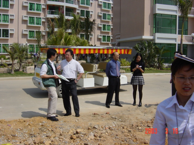 The driver stopped the electric vehicle at the confluence point, and we all piled out for some more photo opportunities. Here Mr Huang, Vice President and Deputy Managing Director (in the blue shirt), is speaking with Emily.