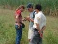 #3: Jim and Targ do the confluence dance as Huang Haili looks on