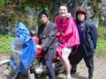 #2: Two motorcyclists who took us to Xiao'aiping, and Tony kitted out in his brand new bright pink raincoat