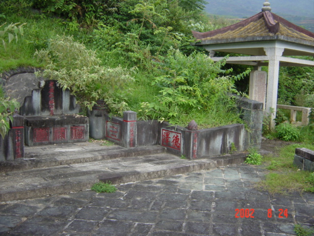 Elaborate grave, sporting its own little tomb-side pavilion.