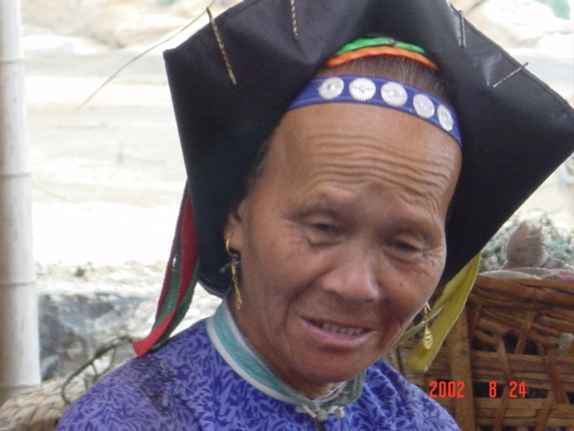 Most of the older women were clothed in traditional dress, including elaborate headwear.