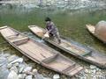 #2: Fisherman bails out boat prior to taking us across Duliu River. (What's wrong with the other two boats?)