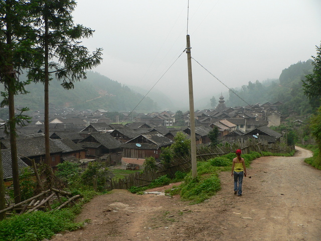 Ah Feng arriving in Kēngdòng, with the confluence 2.17 kilometres east.