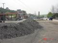 #6: Looking south down main road, with petrol station on left