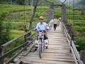 #5: Village chief on motorbike crossing suspension bridge over Wenjiang River