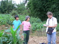 #7: Locals telling Targ the place name: Xīnmín Village Group Three.