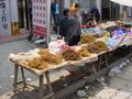 #3: Plastic shoe stall alongside a tobacco stall in Pingkou