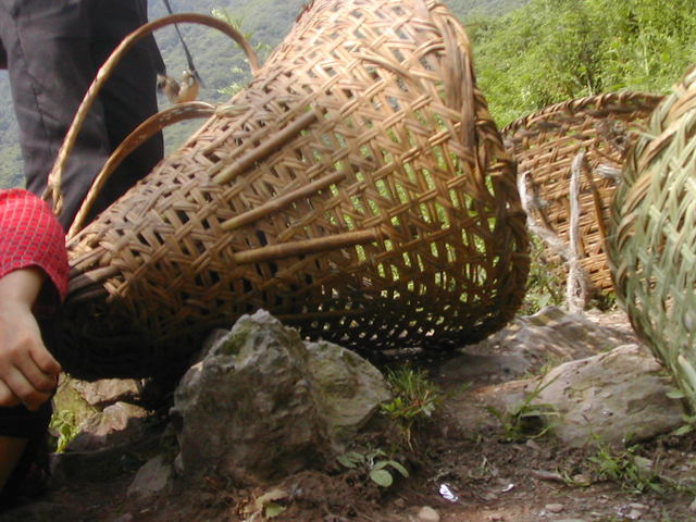 Traditional woven wicker backpacks.