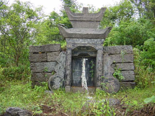 Distinctive Tujia minority nationality grave by the side of the road