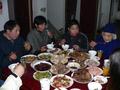 #3: Chinese New Year's Eve feast, left to right: Xu Jing's father, mother, brother and grandmother