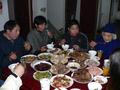 #3: Chinese New Year's Eve feast, left to right: Xu Jing's father, mother, brother and grandmother