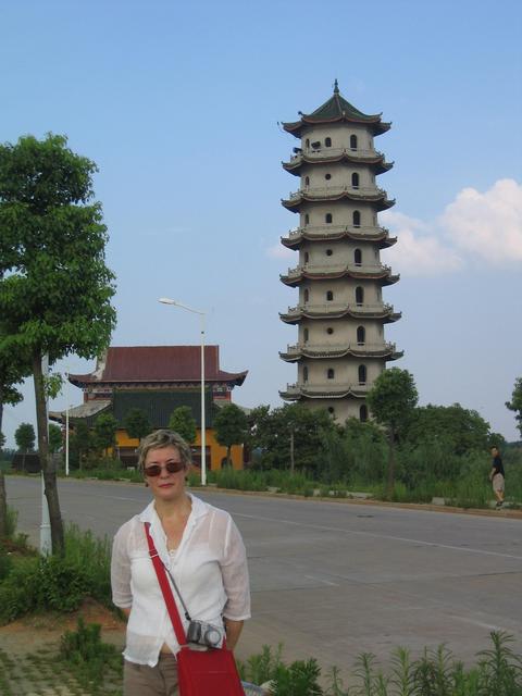 Carmen in front of Daye's tall pagoda.
