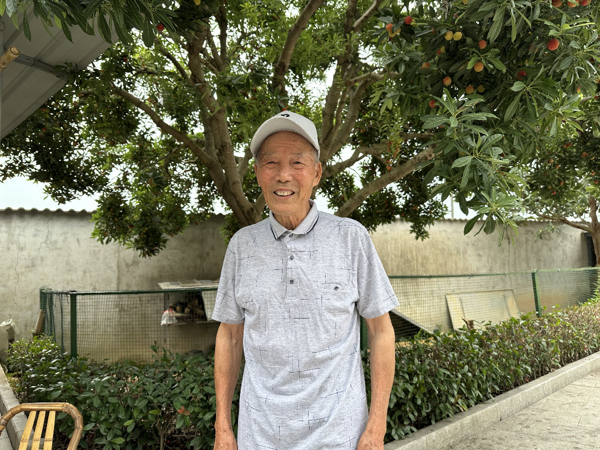 Mr. Xia, who served as the local guide for visitors 19 years ago.