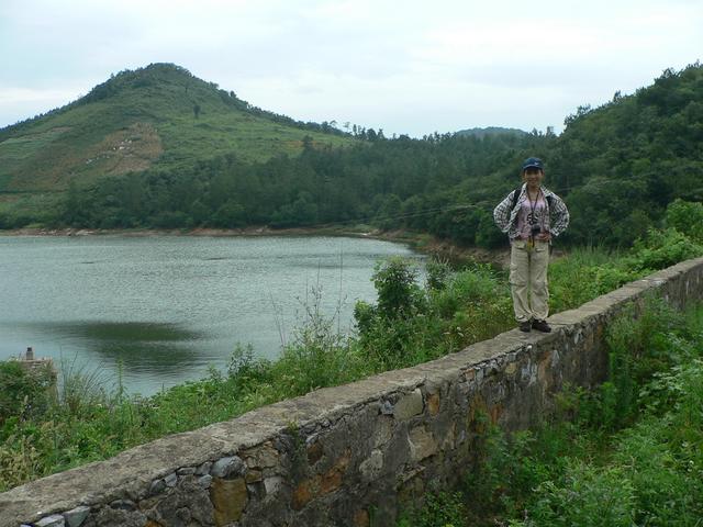 View across lake to confluence on hillside, 400 metres WSW.