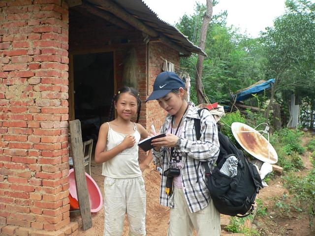 Ah Feng and 10-year-old girl at farmhouse 225 metres NE of confluence.