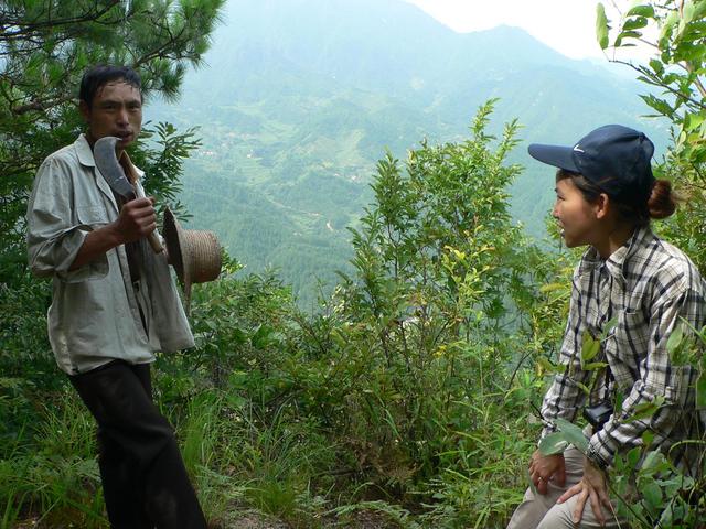 Mr Shen with his machete, and Ah Feng.