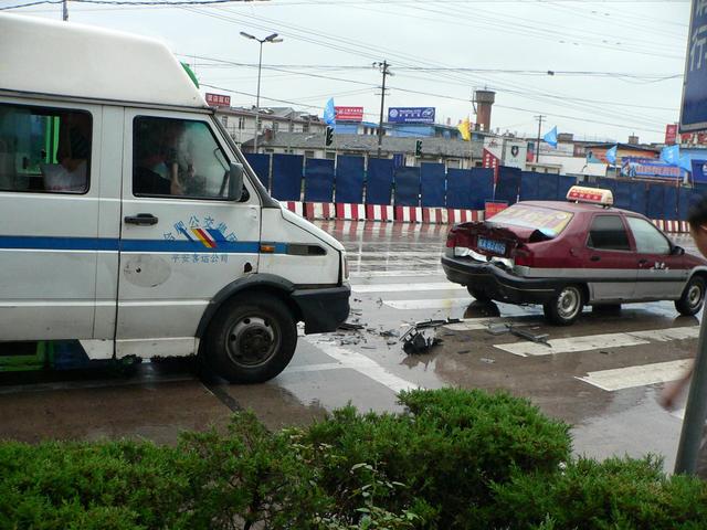 Iveco bus slams into back of taxi.