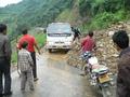 #3: Truck negotiating a landslide on road from Zhushan to Guandu.