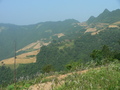 #4: The dirt road ran along the southern slope of a mountain range. Looking SW towards the confluence 1.72 km away.