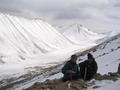 #7: Greg and Robert enjoying success and holding ice axes with U-valley in background.