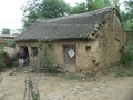 #4: Mud house in the village where we turned left onto a dirt road
