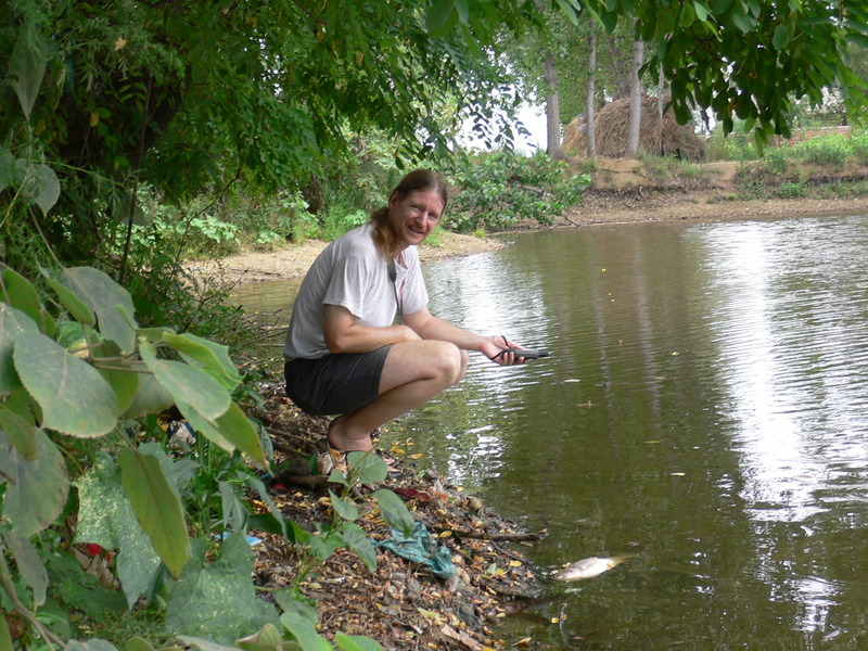 Targ at the water's edge, amid foul-smelling, rotting garbage and the occasional dead fish