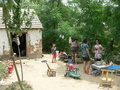 #4: Ah Feng with Mrs Zhèng and her sister, by their house in Wángtáozhuāng Village; the fish pond off to the right