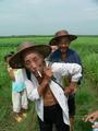 #9: Local farmer dons poison backpack, ready to spray crops.