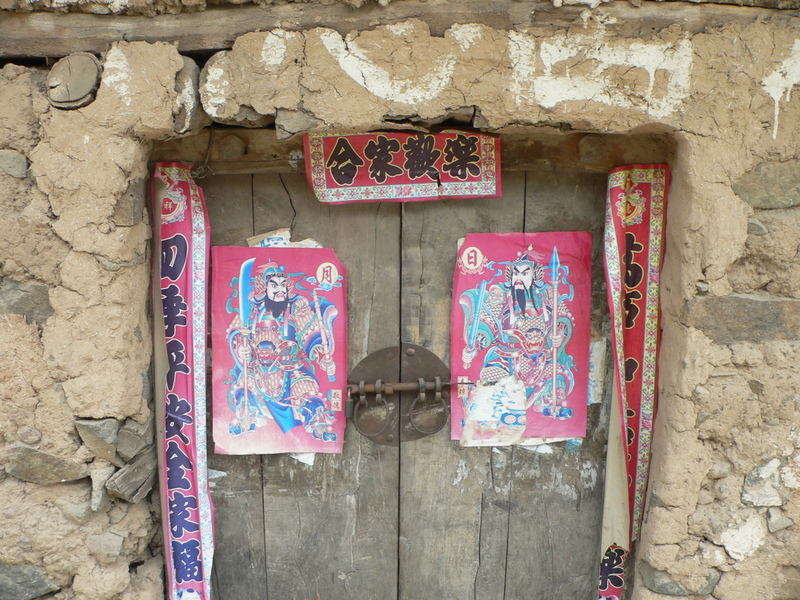 Interesting old lock on the wooden door of a mud house