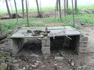 #1: The confluence table: cement slabs supported by stacks of bricks