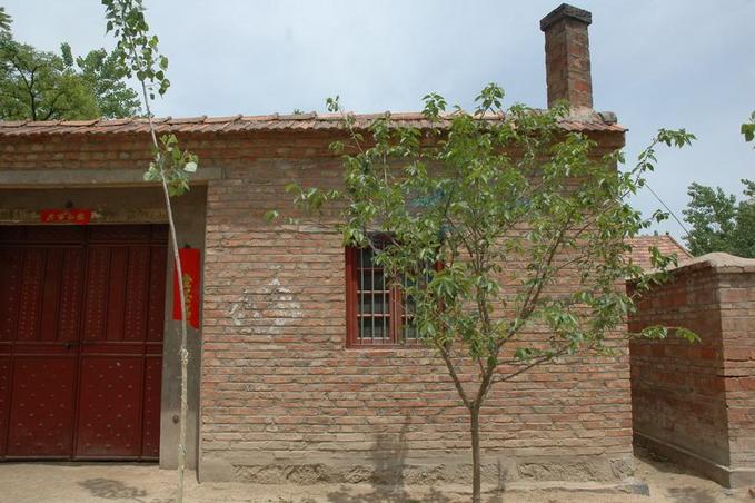 North - gate of the nearest house