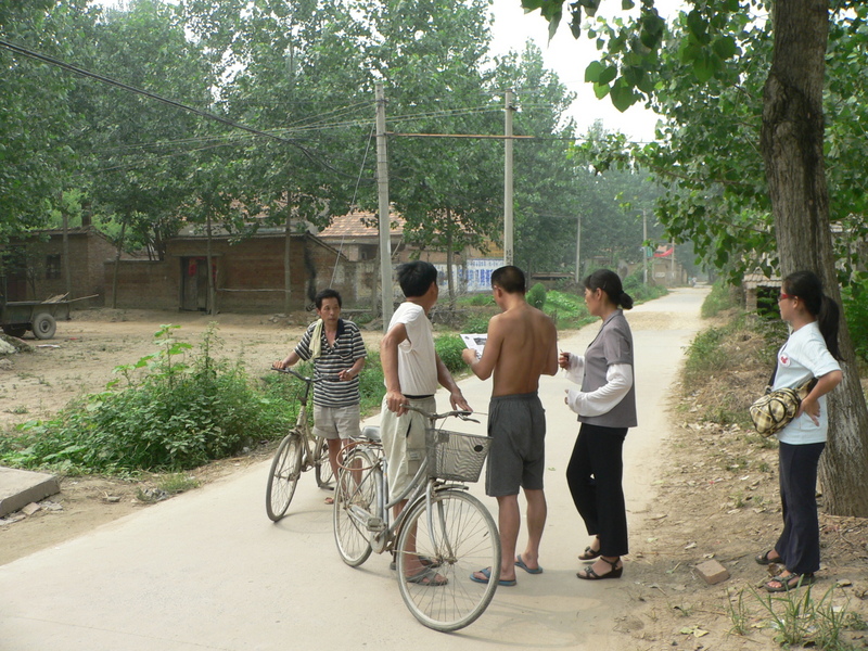 Three locals, our taxi driver and Ah Feng