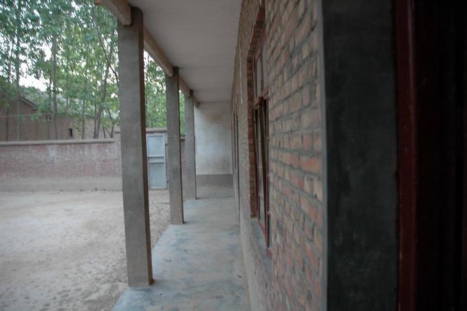 West - the narrow hallway of the school building